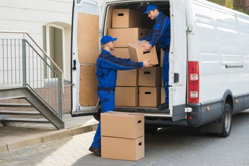 Packed office supplies prepared for relocation in a Roehampton business premises