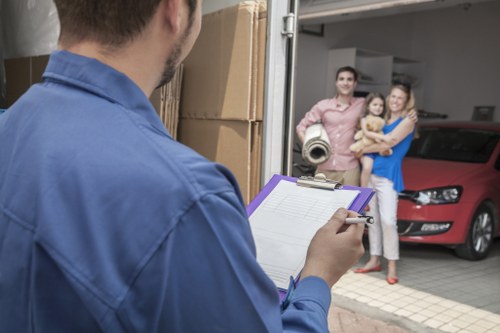 Local moving van helping with furniture transport in Roehampton