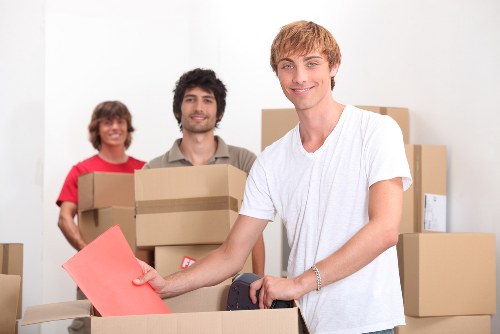 Safely transporting an upright piano through a Roehampton property