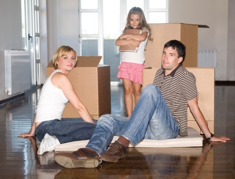 Office furniture removals in Roehampton with desks and storage units being moved